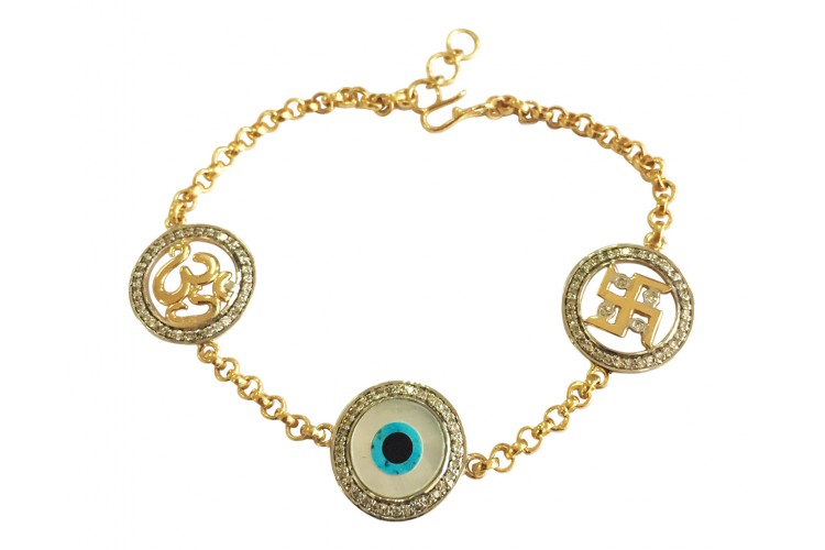Auspicious Om Evil Eye and swastika bracelet in gold with diamonds